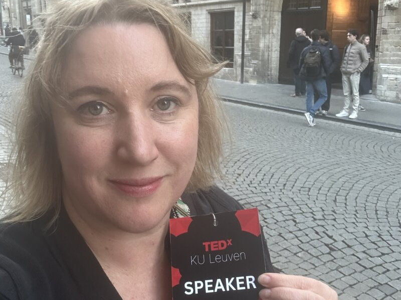 Carla outside TEDx venue Carla with her TEDx Speaker pass, outside venue